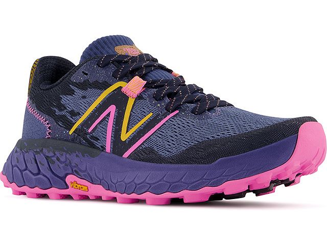 Front angled view of the Women's Trail Hierro V7 by New Balance in the color Night Sky / Vibrant Pink