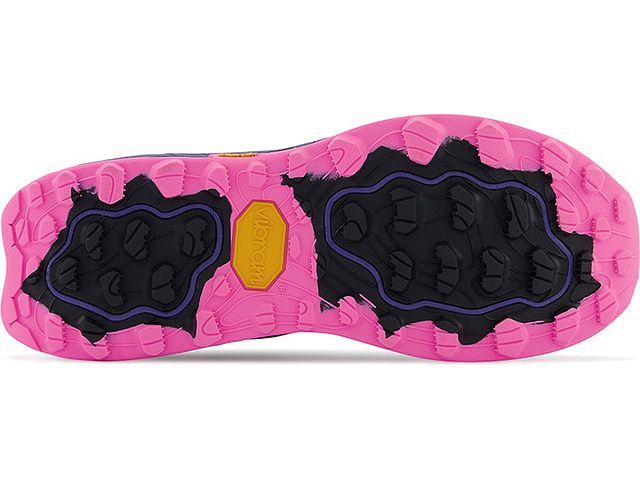 Bottom (outer sole) view of the Women's Trail Hierro V7 by New Balance in the color Night Sky / Vibrant Pink