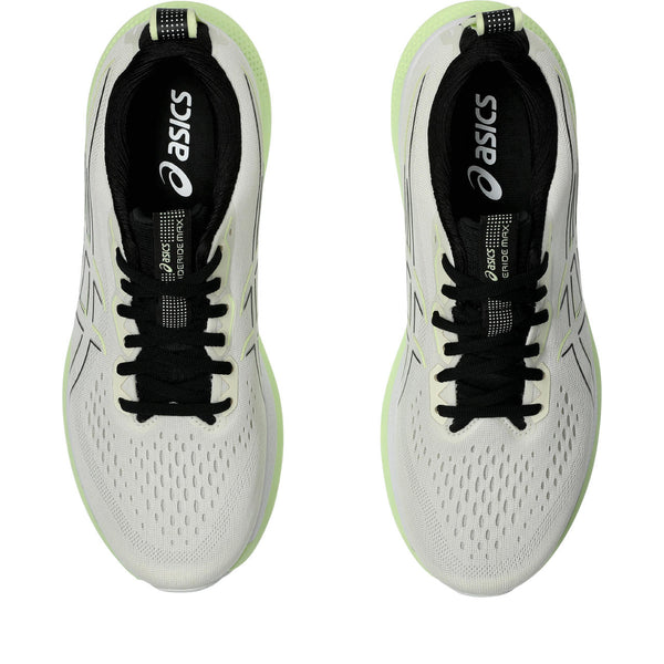 The heel of this shoe has a black and green pull tab.