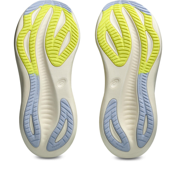 Close-up of a pair of running shoes with a focus on the sole design.