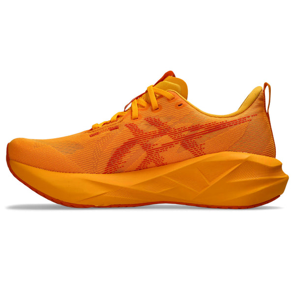 The medial side of an orange Novablast with a large brand logo.