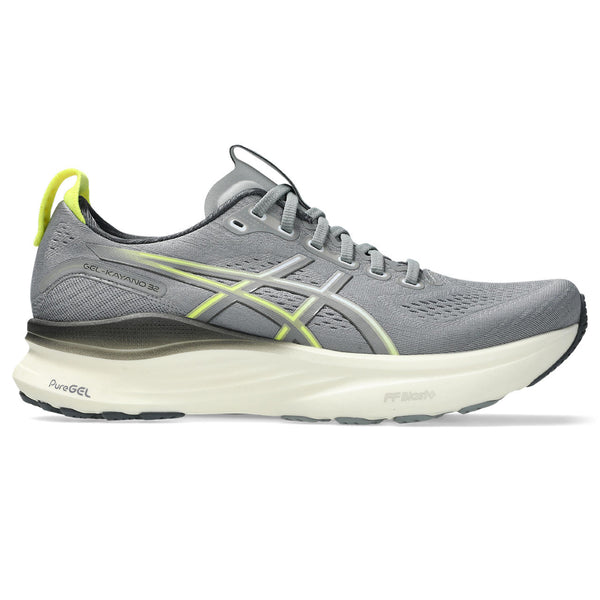 Gray running shoe with green accents on a white background.