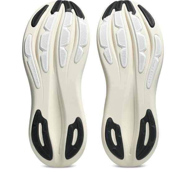 White shoe insoles with black accents on a white background