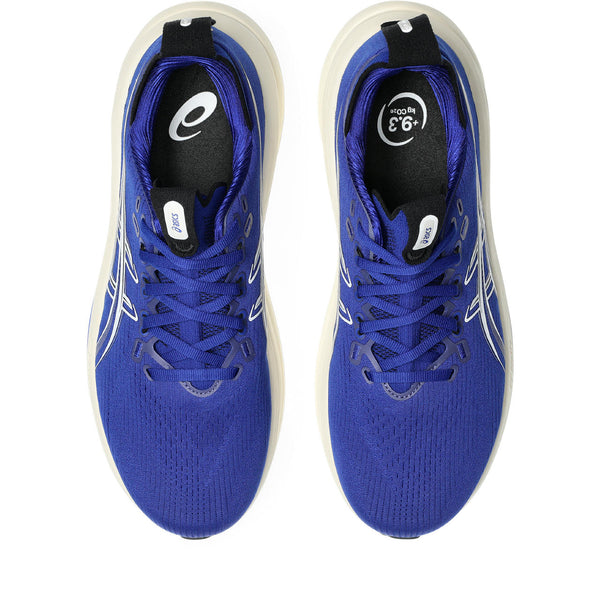 Blue running shoes with white soles on a white background