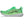 Green running shoe with white sole on a white background