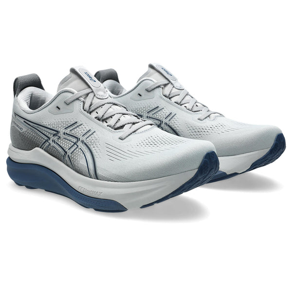 A dark grey ASICS logo is in the middle of the upper on both sides. 