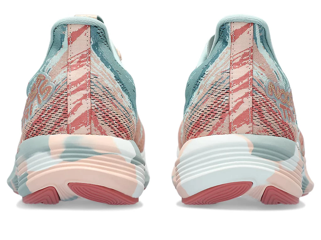 Back view of the Women's Noosa Tri 15 by ASICS in the color Pure Aqua/Pale Apricot