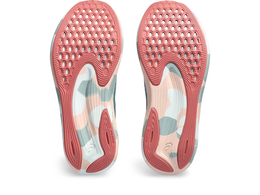 Bottom (outer sole) view of the Women's Noosa Tri 15 by ASICS in the color Pure Aqua/Pale Apricot