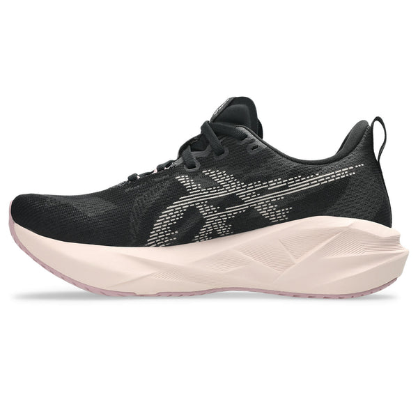 The midsole has geometric cutouts. 
