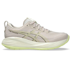 This women's running shoe has a very tonal beige look and a slight pop color on the outsole and logo.