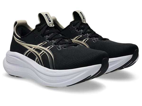 A cream colored Asics logo is in the middle of the upper on both sides. 