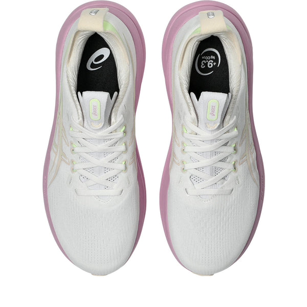 White running shoes with pink accents on a white background