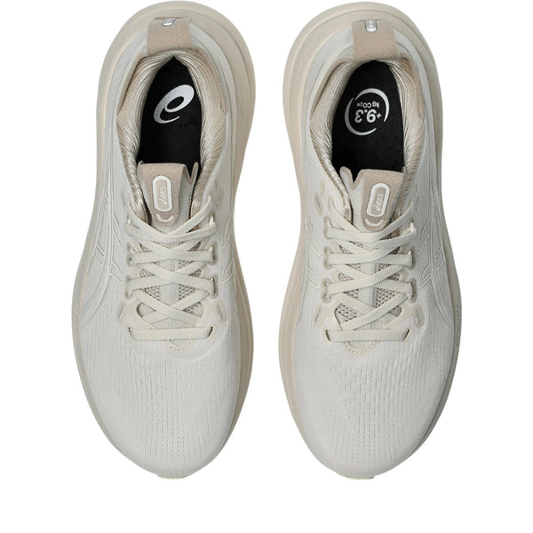 Cream laces are used to match the upper. 