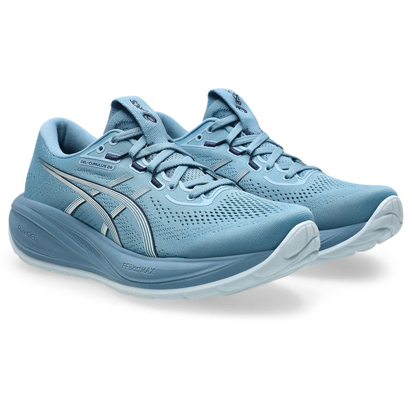 Pair of blue running shoes on a white background