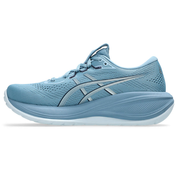 Blue ASICS running shoe on a white background.