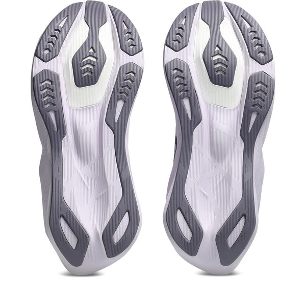 Pair of gray and white athletic shoes on a white background