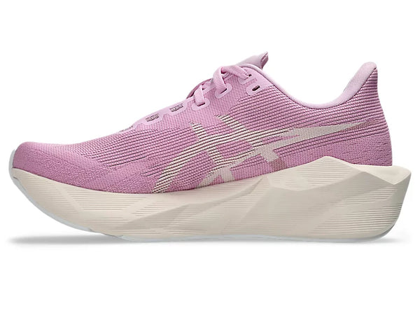 Lilac purple running shoe on a white background
