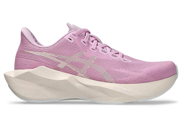 Lilac purple running shoe on a white background