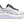 Purple and black running shoe on a white background