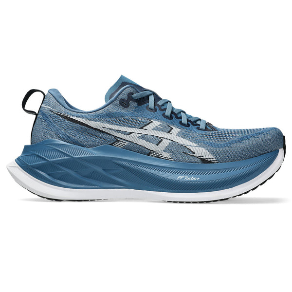 Blue running shoe with white sole on a white background
