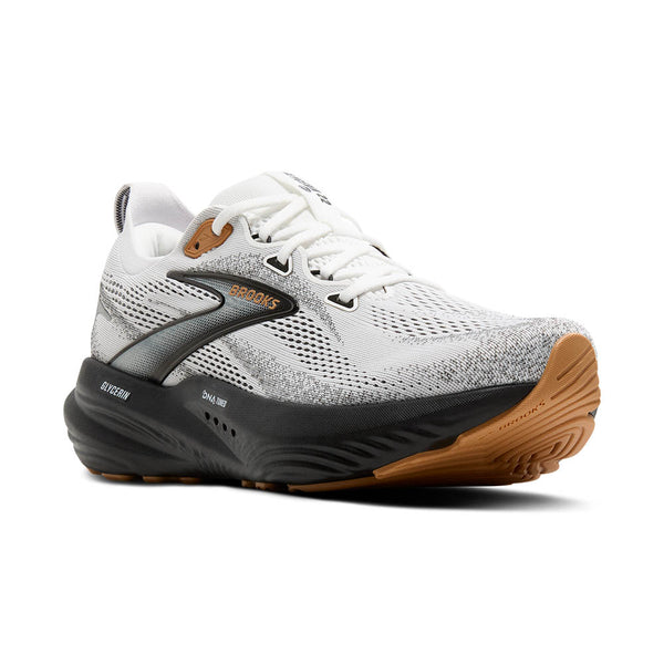A grey and black ombre Brooks logo is in the middle of the upper on both sides. 