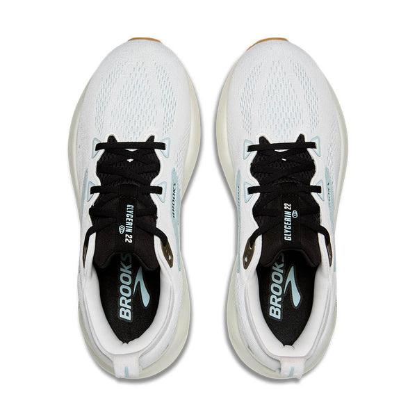 A birds-eye view of this shoe shoes black laces and a black insole. 