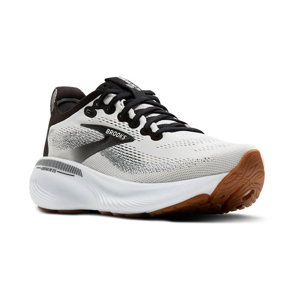White running shoe with black accents and brown sole on a white background