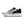 The medial side of this Brooks shoe has a large black material wrapped around teh heel and medial part of the upper.