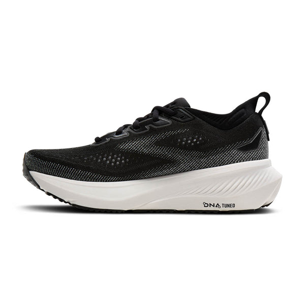 Black running shoe with white sole on a white background