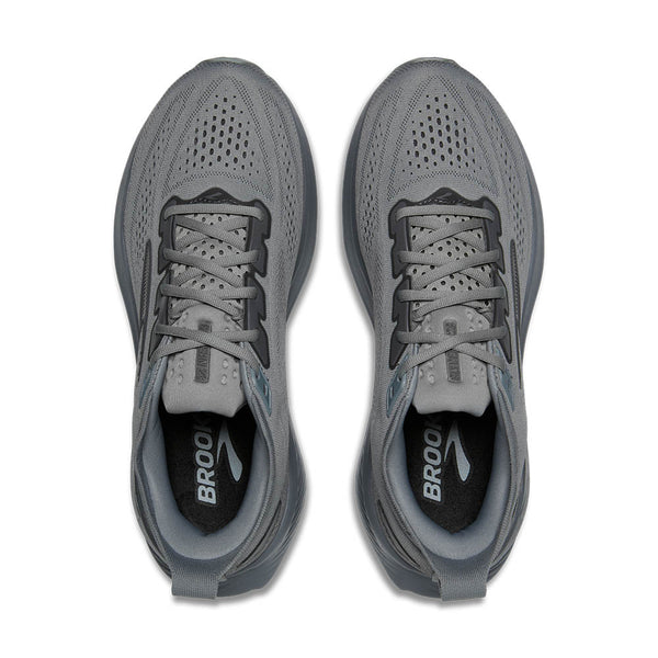 Pair of gray running shoes with 'Brooks' branding on a white background