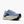 Blue running shoe with a white sole on a white background