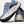 Blue and white running shoes with 'Brooks' branding on a light gray background