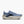 Blue running shoe with white sole on a white background