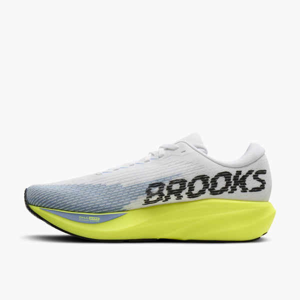 Brooks running shoe in white and light blue with a bright yellow midsole and black 'BROOKS' branding on the side, shown against a plain white background.