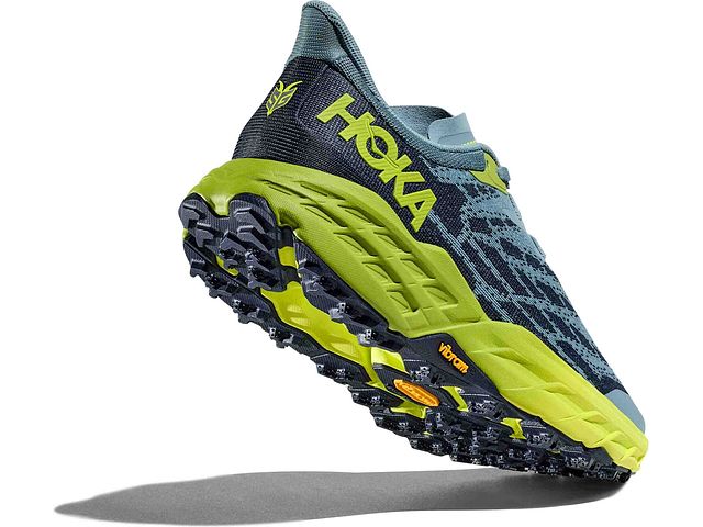 Back angled view of the Men's Speedgoat 5 by HOKA in the color Stone Blue / Dark Citron
