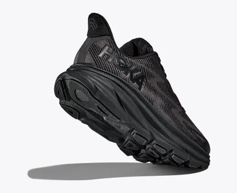 Back angle view of the Women's Clifton 9 by HOKA in the color Black/Black