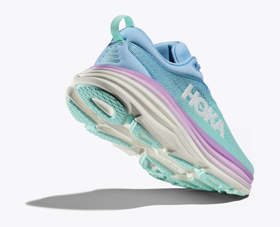 Back angle view of the Women's Bondi 8 by HOKA in the color Airy Blue/Sunlit Ocean