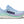 This Gaviota 5 has a light blue upper and a purple, green, and white midsole. 