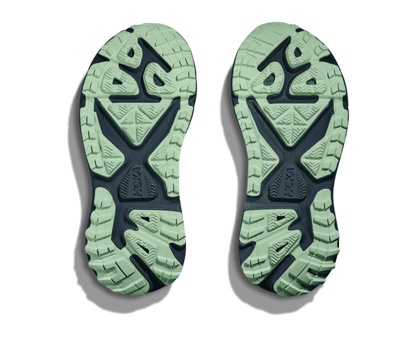 Green rubber is used on the outsole to contrast the blue midsole. 