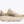Cream and off-white running shoe on a white background
