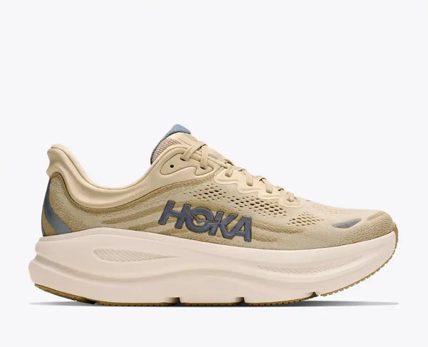 Cream and off-white running shoe on a white background
