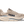 Beige running shoe with Hoka branding on a transparent background