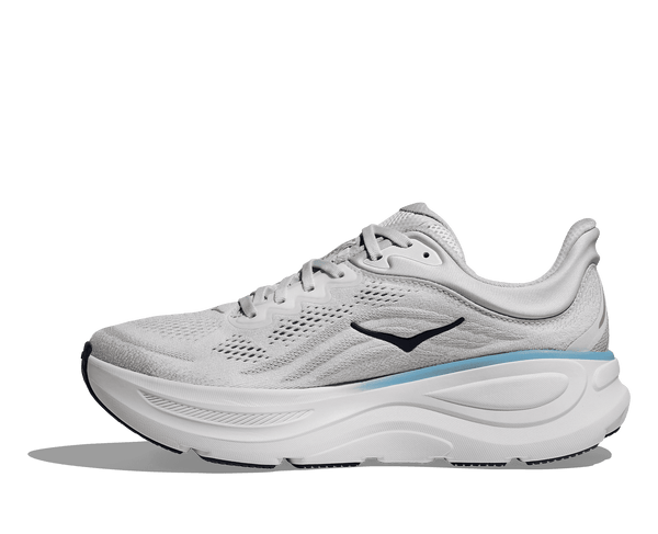 The Hoka logo is stitched in the middle on the medial side of the upper in black thread. 