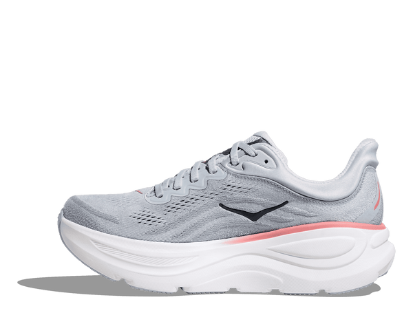 Gray running shoe with white sole on a transparent background