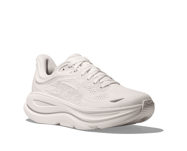 A white Hoka decal is in the middle on the lateral side of the upper. 