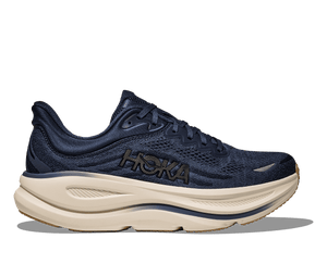 Navy running shoe with white sole on a transparent background
