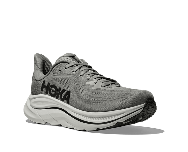 Hoka is stitched on the lateral side of the upper using black thread. 
