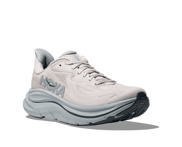 Light pink running shoe with 'Hoka' branding on a transparent background