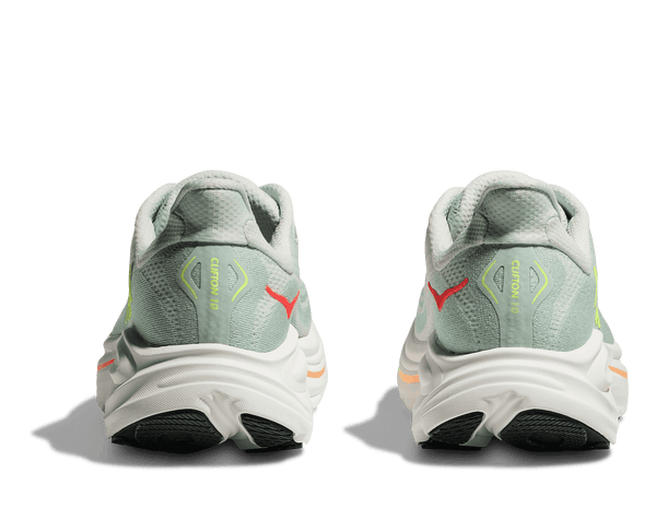 Pair of gray running shoes with visible brand logo on a transparent background