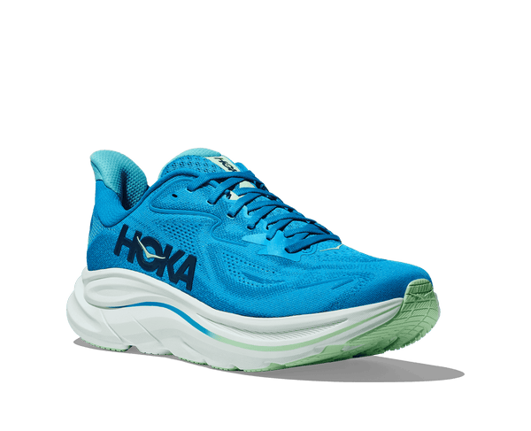 A blue and green line runs through the middle of the white midsole. 